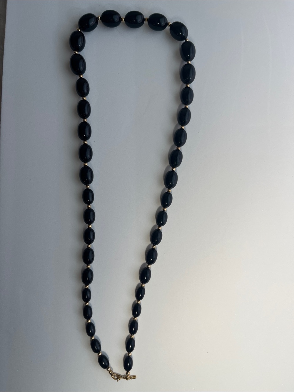 Monet Black Oval Bead Necklace with Gold Accents